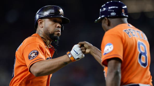 Altuve scores on wild pitch in 10th, Astros beat Texas 4-3