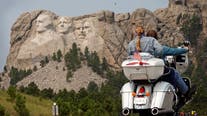New regulations pose greatest challenge for tourist flights over national parks, especially Mount Rushmore