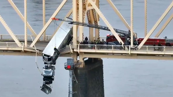 Louisville driver rescued from semi-truck hanging over 2nd Street Bridge