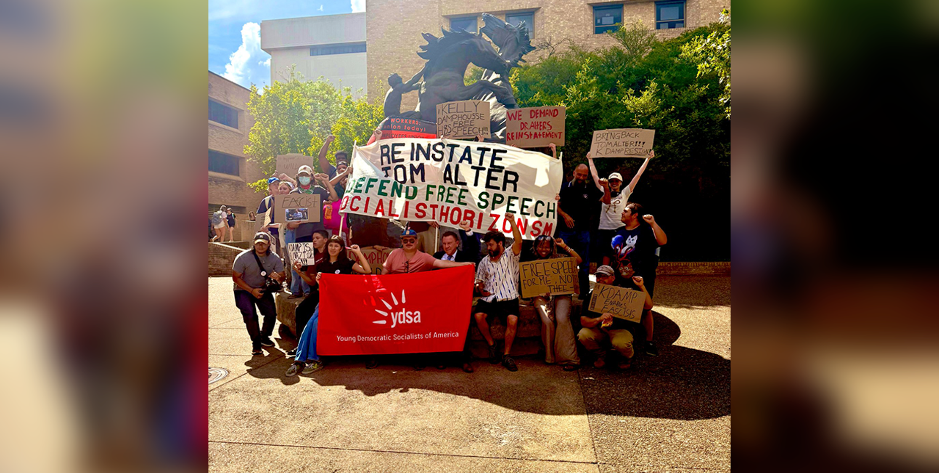 Texas State University students, staff rally in support of former professor