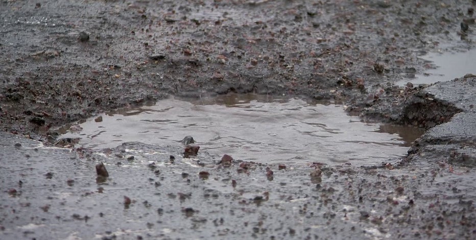 Minneapolis potholes uncover city's old brick streets and streetcar lines
