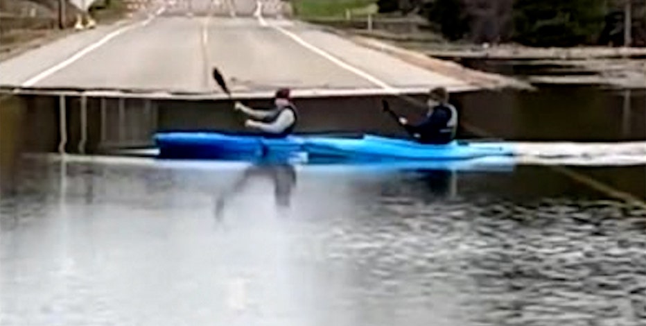 Kayakers cross flooded Minnesota road: 'So Minnesotan'