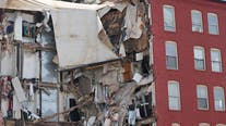 More bodies found in Iowa apartment collapse as lawsuits began
