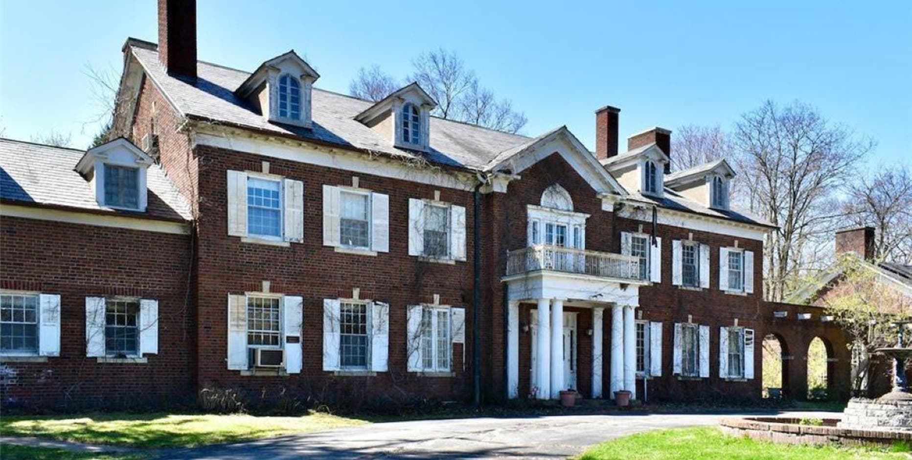 Winona mansion with tunnel and hidden library is on the market for $750K