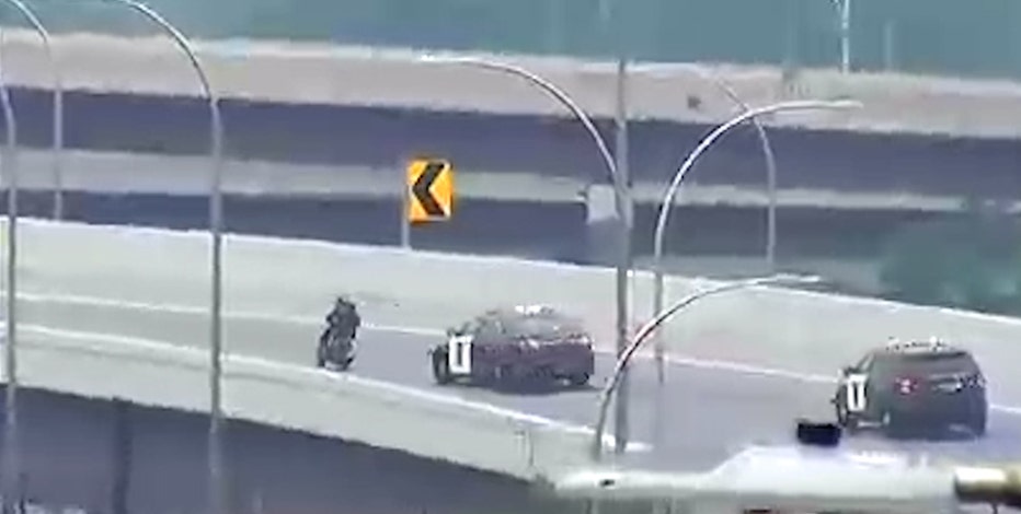 Video: Man on moped leads police on low-speed chase on I-94 in Minneapolis