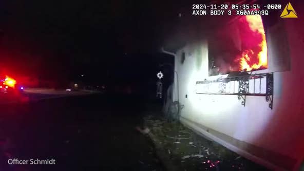 South St. Paul police rescue woman from burning house: Bodycam video