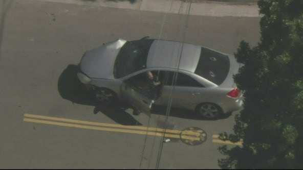 Manhunt underway in Pacoima for armed suspect who crashed into police cars