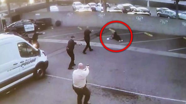 Video: Rialto police shoot man armed with AR-15 style rifle in station parking lot
