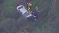 LAFD airlifts woman after 100-foot crash down cliff off Mulholland Drive