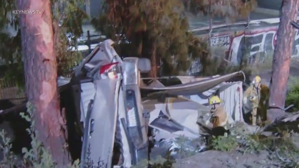 Car goes off 405 Freeway, crashes onto Van Nuys homeless encampment
