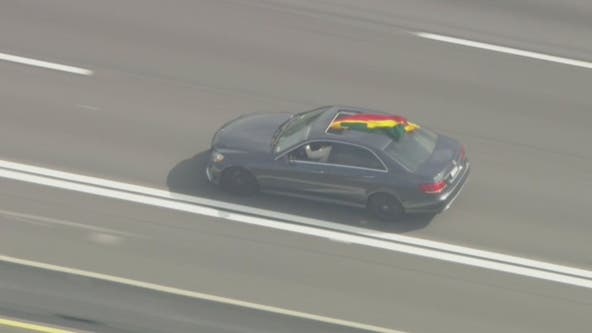 LA police chase continues as suspect flies Rasta flag while weaving through traffic