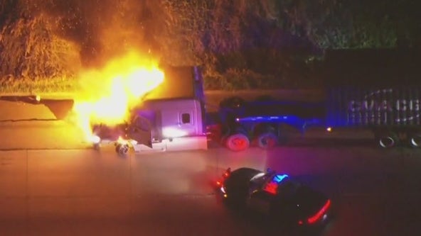 Suspect in custody after big rig chase ends in fiery wreck