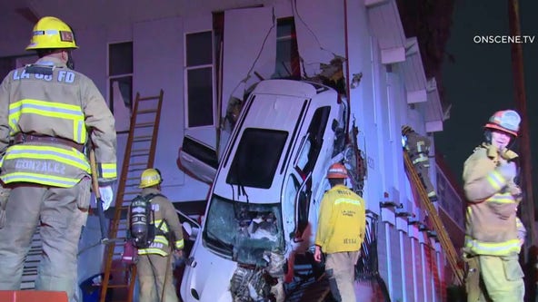 Car goes airborne, crashes into 2nd floor of Vernon building