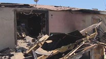 Family forced to live in trailer after fireworks sparked blaze, burning down their home of 20 years