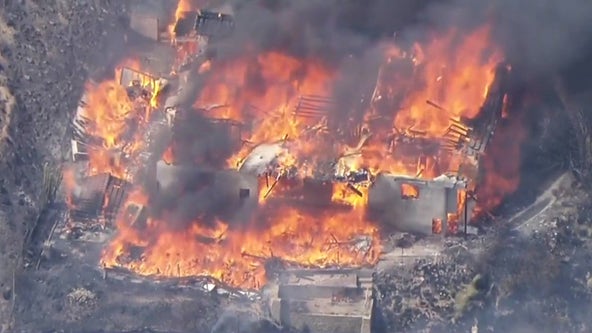 California wildfire burns down homes in San Bernardino County