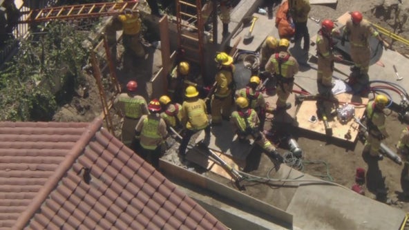 Construction worker rescued after being trapped for hours in deep trench at Los Feliz home