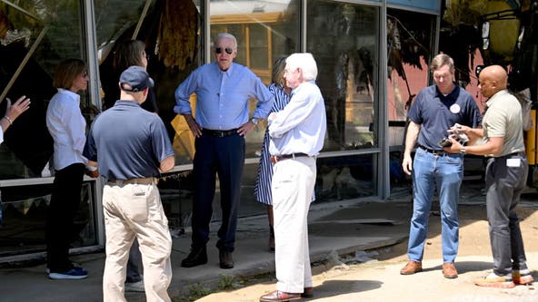Biden surveys flood damage in Kentucky as state braces for more storms