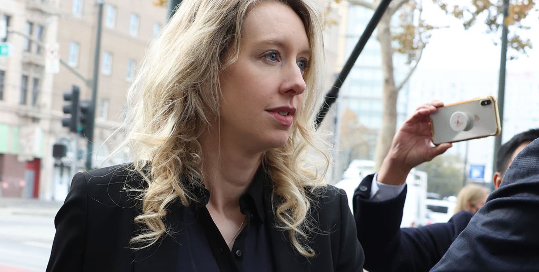 Elizabeth Holmes briefly delays prison term with last-minute appeal