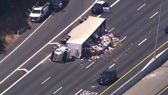 Overturned garbage truck near Sunol flips over