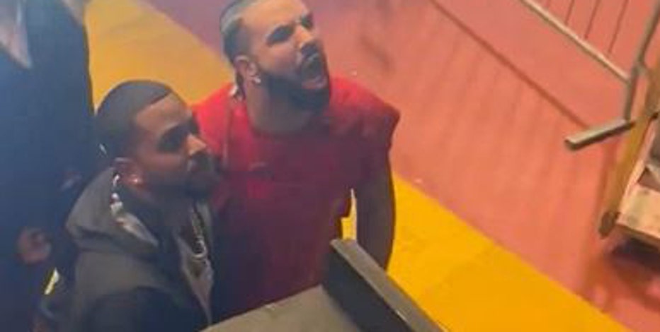 Watch: Drake confronts male fan who fought woman for his towel at concert