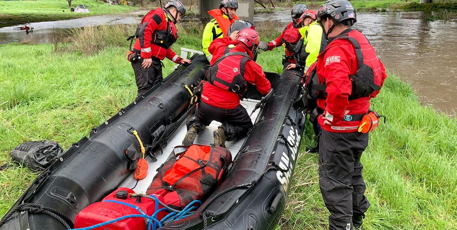 People, dogs and puppies rescued from Guadalupe River in San Jose