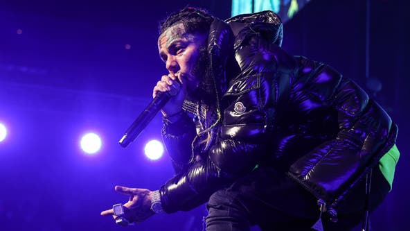 Watch: Rapper Tekashi 6ix9ine dodges beer can thrown at him during baseball game