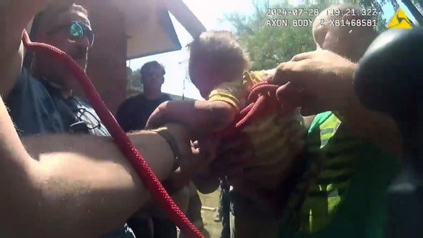 Watch: Crews get creative to rescue baby from 10-foot-deep hole