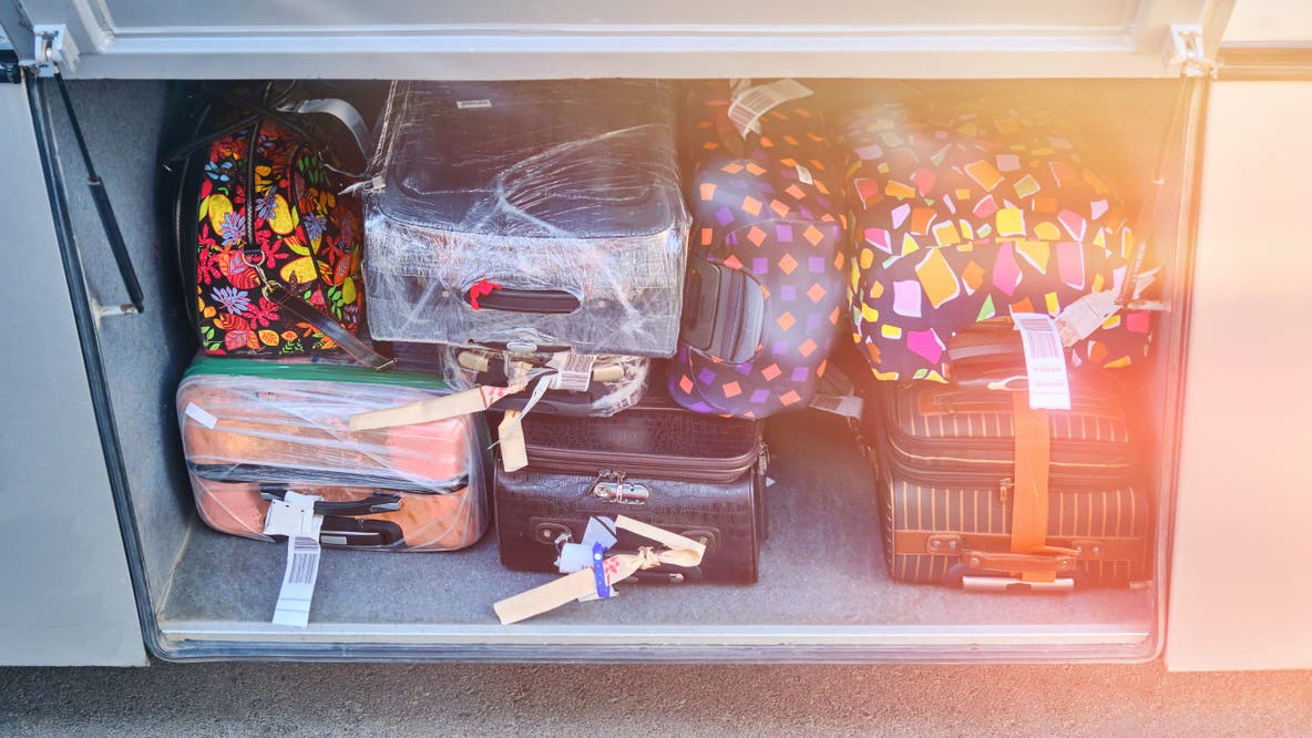 Woman arrested after bus driver finds toddler in suitcase