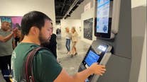 Art installation ATM takes your photo — then displays and ranks your bank account