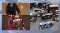 Lacey officers wait at stolen vehicle for suspect to return to it after leaving Target with stolen merchandise
