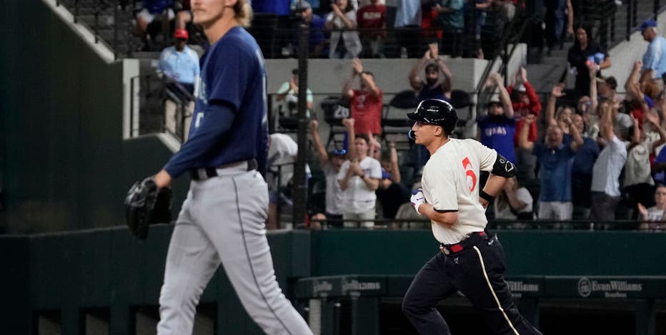 Rangers back on top of AL West after 8-5 win in opener over Mariners, and a loss by Astros