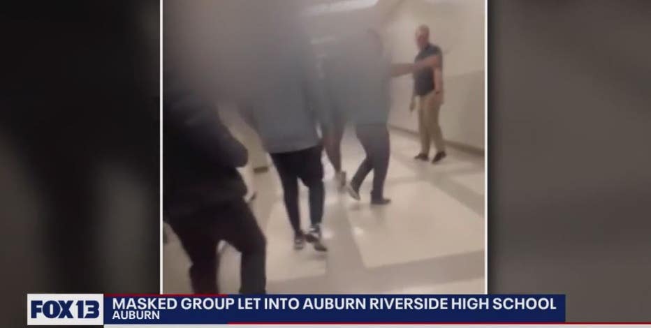 Cell video shows chaos erupt at Auburn Riverside High School as masked kids run the halls, hitting students