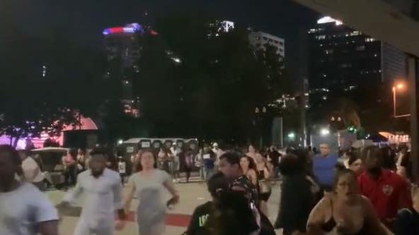 Video shows crowd running after noise mistaken for gunshots at Orlando fireworks show