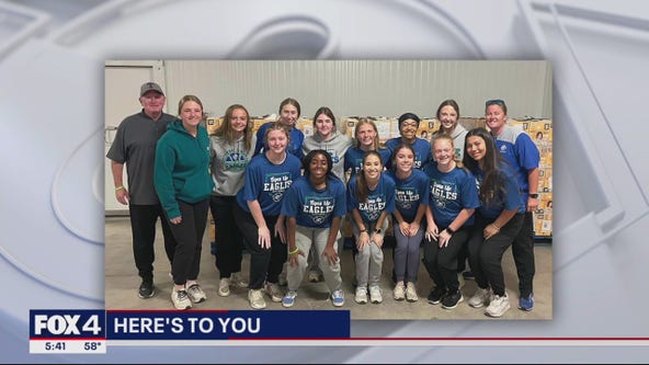 Softball team helps out TAFB during Spring Break