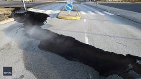 Crack splits street in Icelandic town threatened by volcano