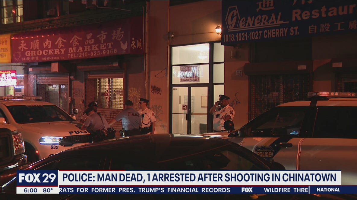 Man killed in Chinatown shooting, another man in custody, police say