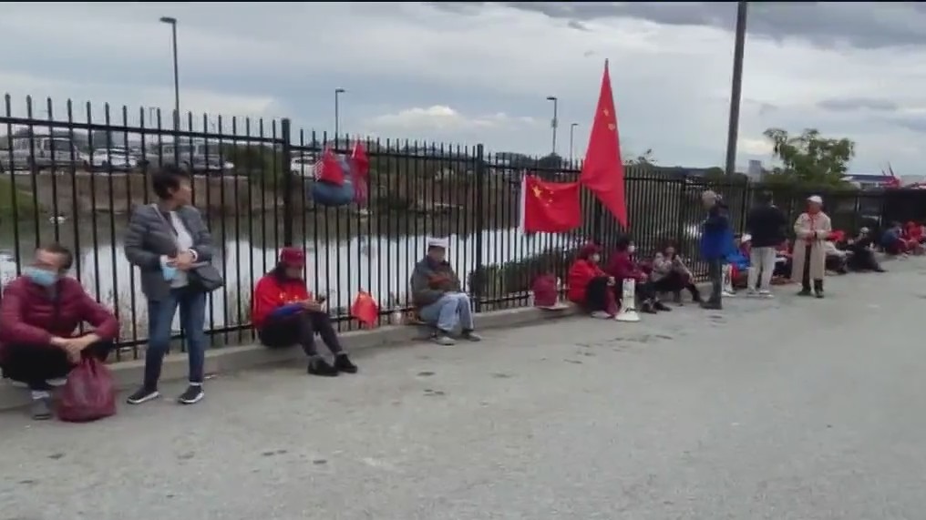 Protestors claim they were attacked by Chinese government agents