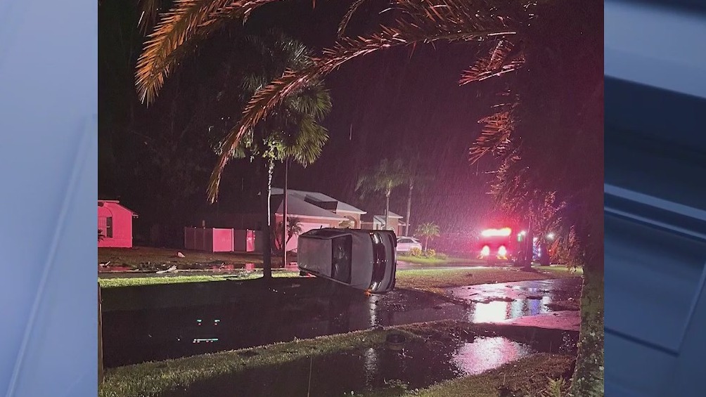 Possible tornado flips vehicle in Palm Coast