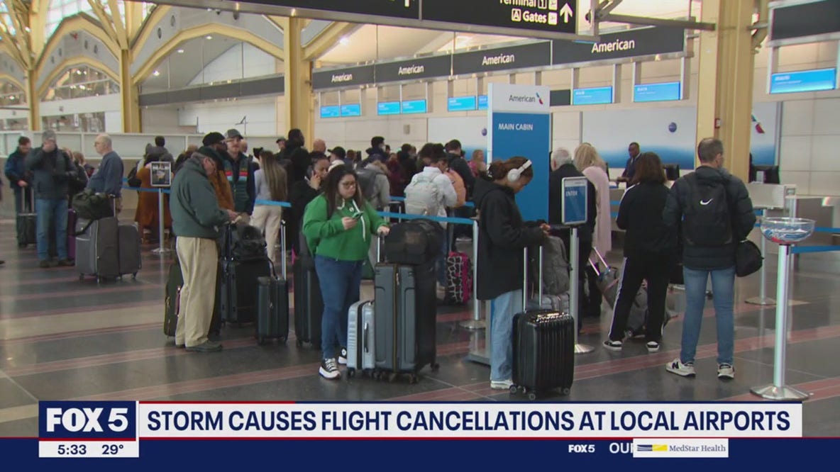 DC snowstorm causes chaos at airports with hundreds of cancelations, delays