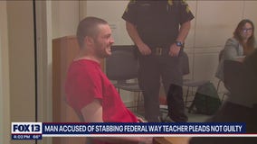 Man accused of stabbing Federal Way teacher laughs in court