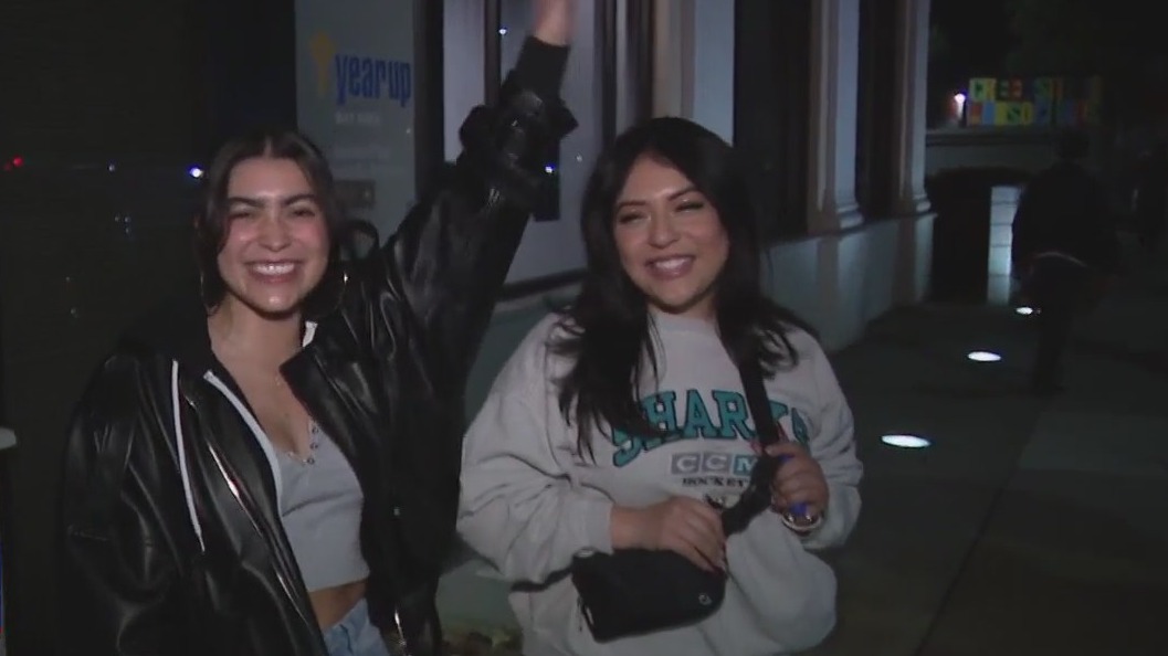 SJ Sharks fans celebrate their first win of the season