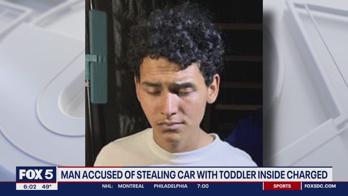 Man accused of stealing car with toddler inside charged