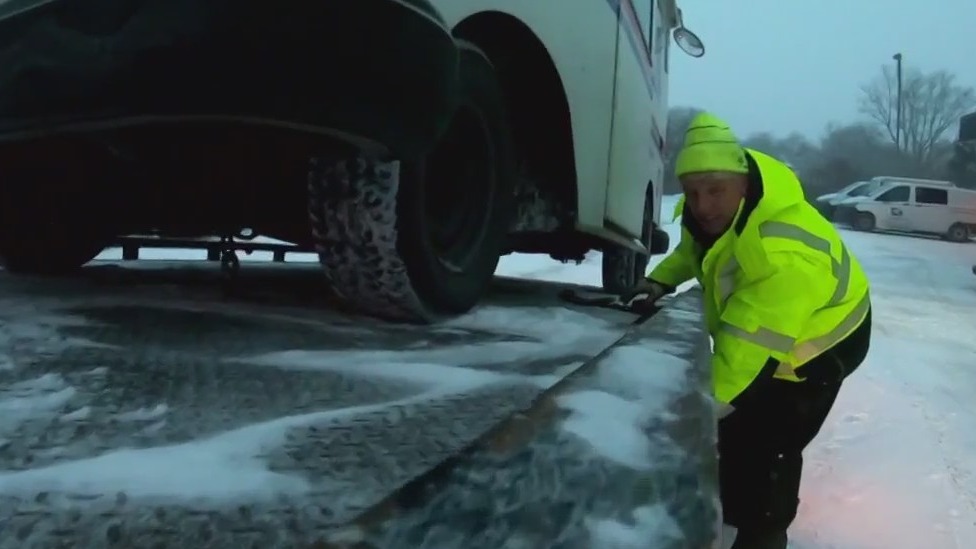 Tow trucks busy, winter storm creates tough travel conditions