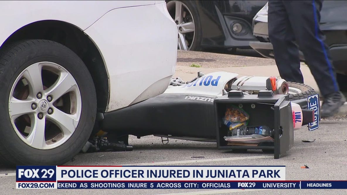 Officer on dirt bike struck by Honda CRV in Philly