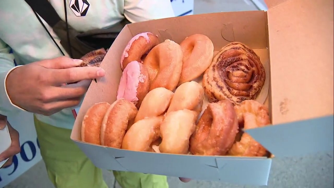 Many wait in line for Dutch Girl Donuts on reopening day