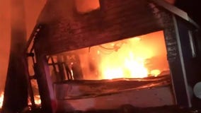 Gig Harbor firefighters battle garage fire, saving chickens in the process