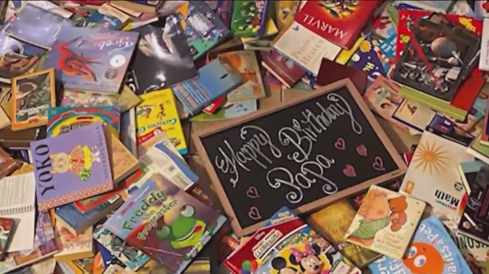 Young woman donates thousands of books to children coping with cancer
