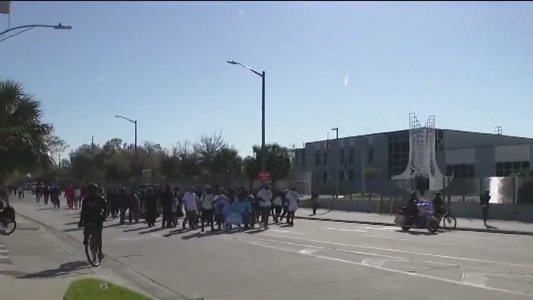 Orlando police along with residents march in show of unity