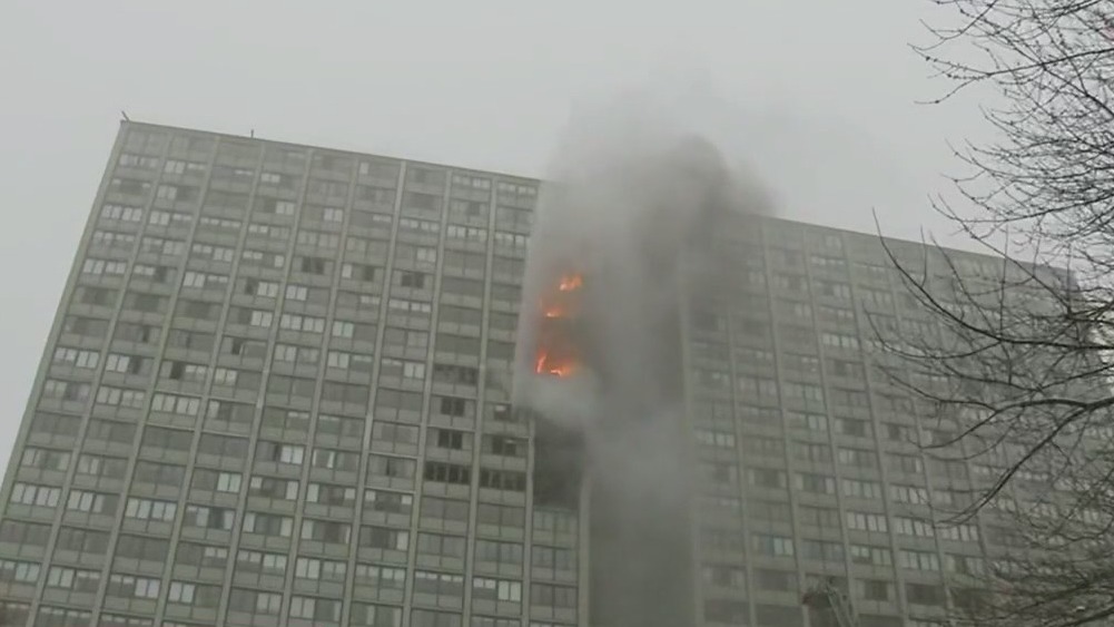 Chicago firefighters battle extra-alarm fire at high-rise apartment