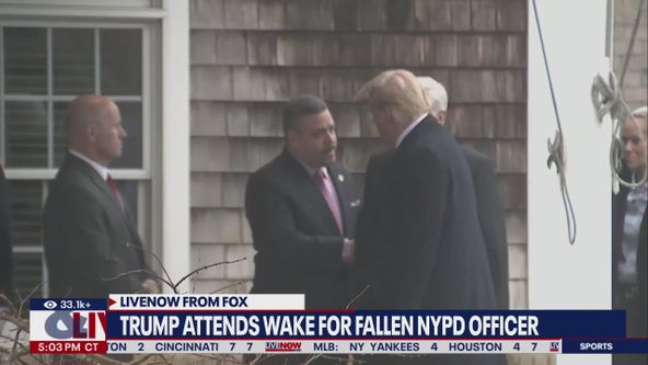Trump attends fallen NYPD officer's wake